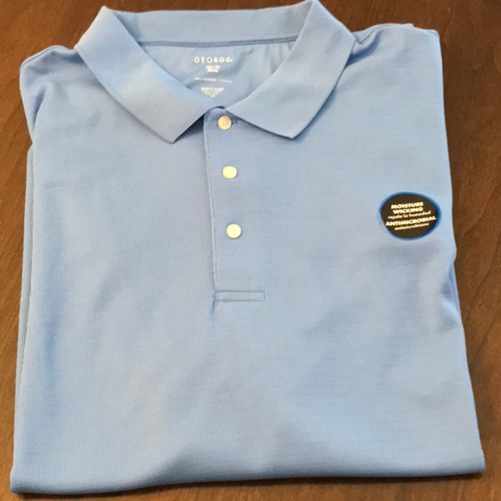 Men’s 3XL light blue golf shirt that is new without tags - 100 percent polyester